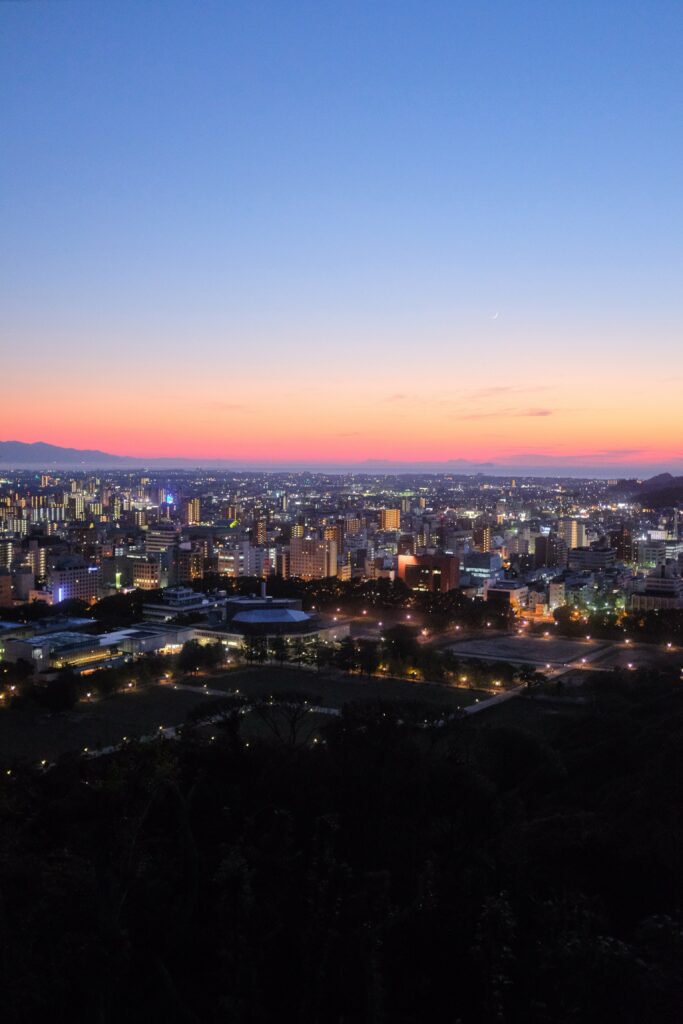 Stunning Aerial Cityscape Wallpaper at Dusk: Vibrant Urban Background
