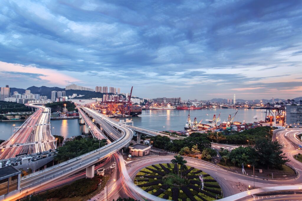 Stunning Cityscape Wallpaper: Bridges, Modern Buildings & Serene Waterfront
