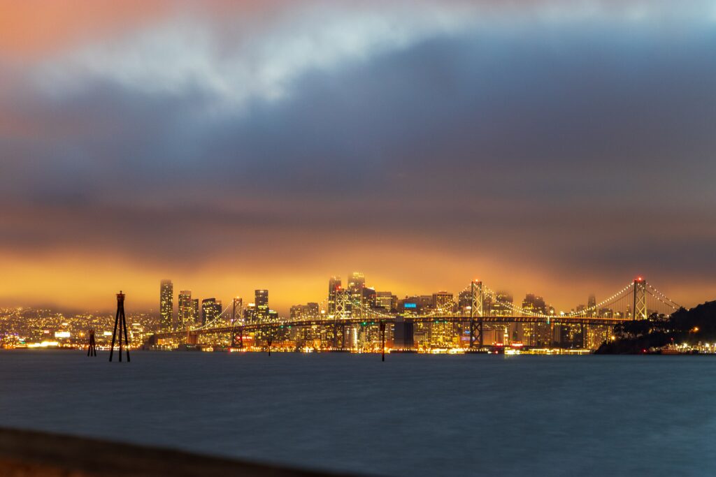 Enchanting Cityscape Wallpaper: Bright Bridge & Vibrant City Lights