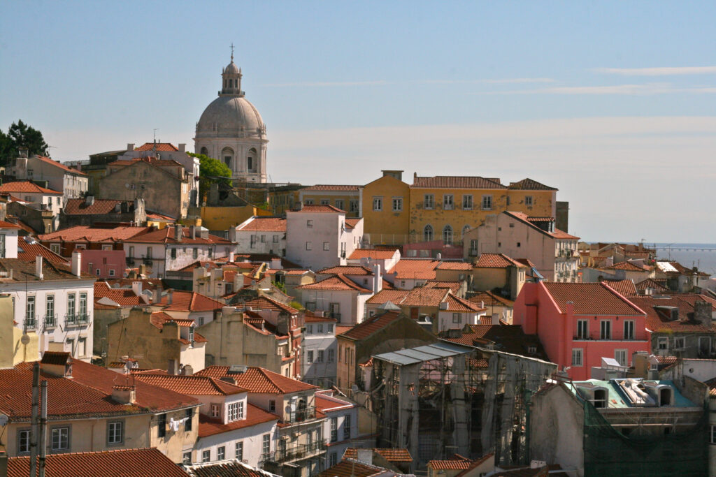 Charming Cityscape Wallpaper: Colorful Rooftops & Historic Dome