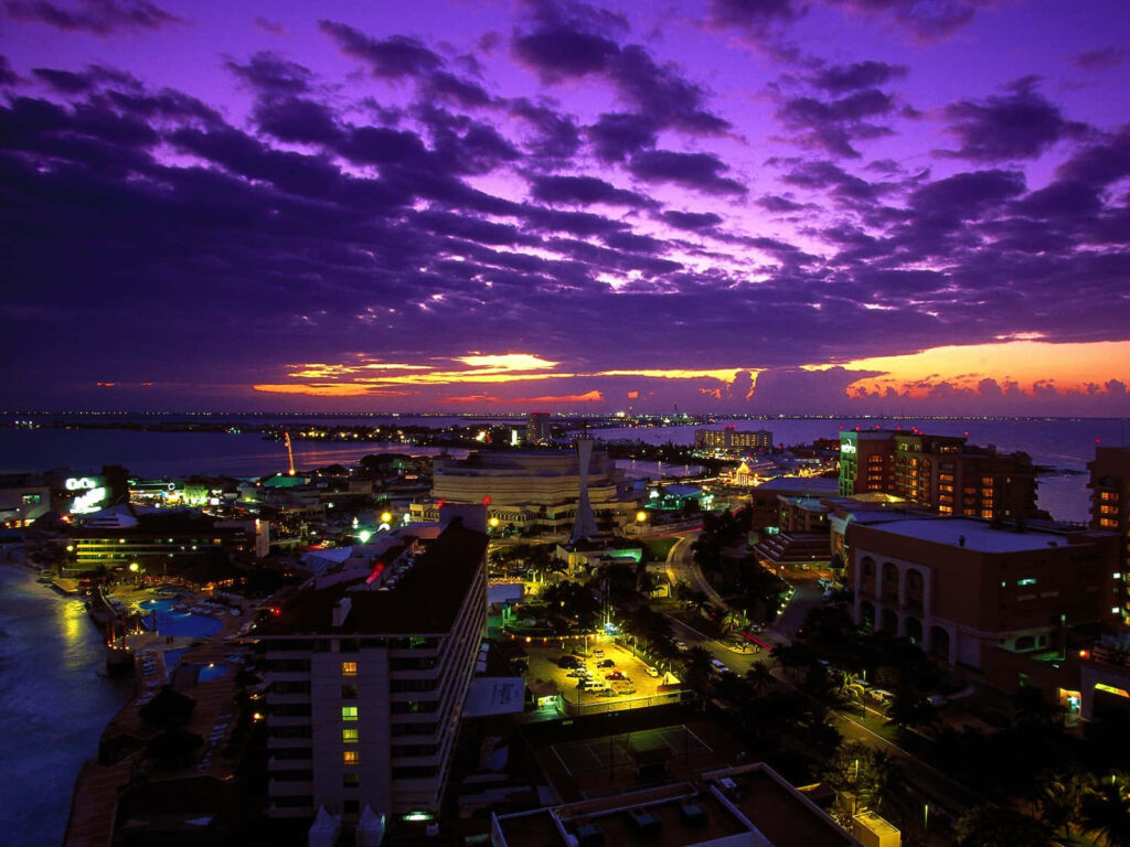 Vibrant Cityscape Aerial View at Sunset - Colorful Wallpaper Background