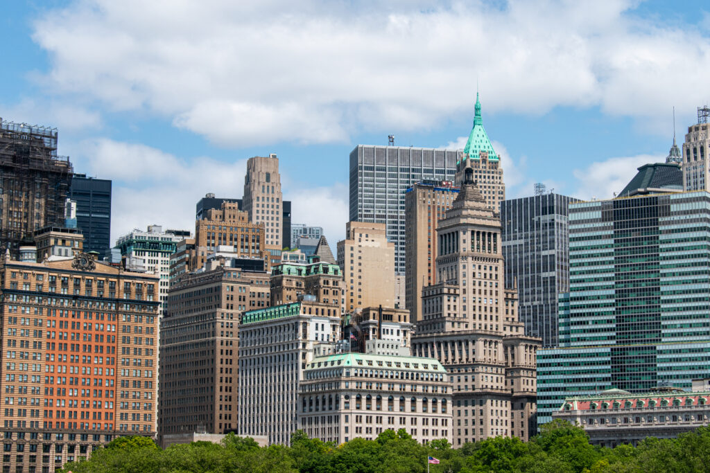 Stunning Cityscape Wallpaper: Diverse Architecture Under Clear Skies