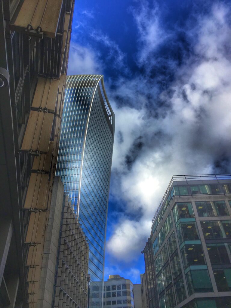Stunning Cityscape Wallpaper: Majestic Towers & Vibrant Sky