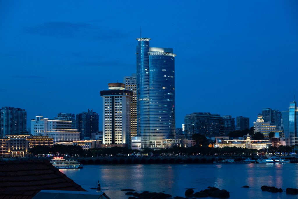 Vibrant Cityscape Wallpaper: Modern Architecture at Twilight Reflection