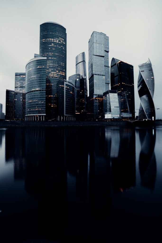 Stunning Cityscape Wallpaper: Modern Skyscrapers & Serene Reflections