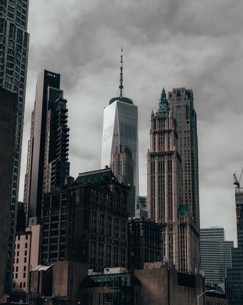 Stunning Cityscape Wallpaper: Skyscrapers & Architecture Under Gray Sky