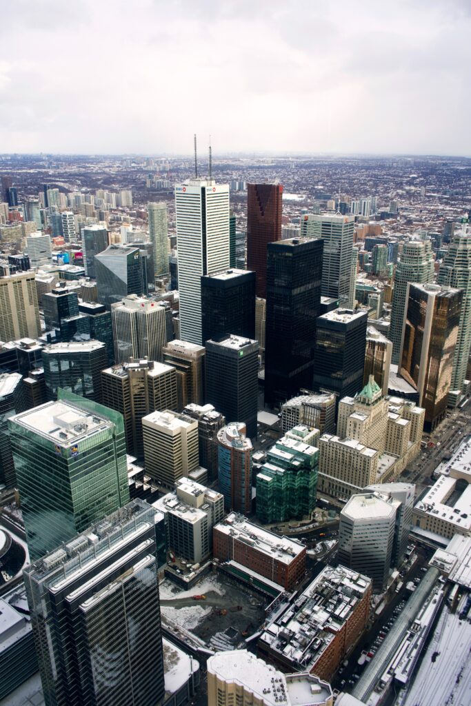 Stunning Cityscape Wallpaper: Snow-Dusted Skyscrapers & Modern Design