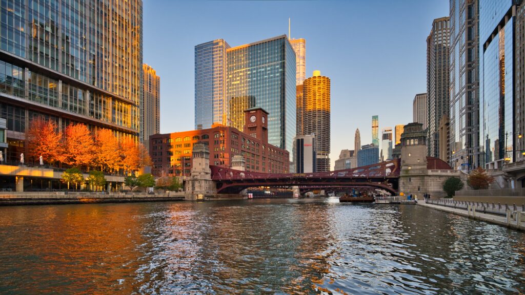 Stunning Sunset Cityscape Wallpaper with Bridge and Waterway