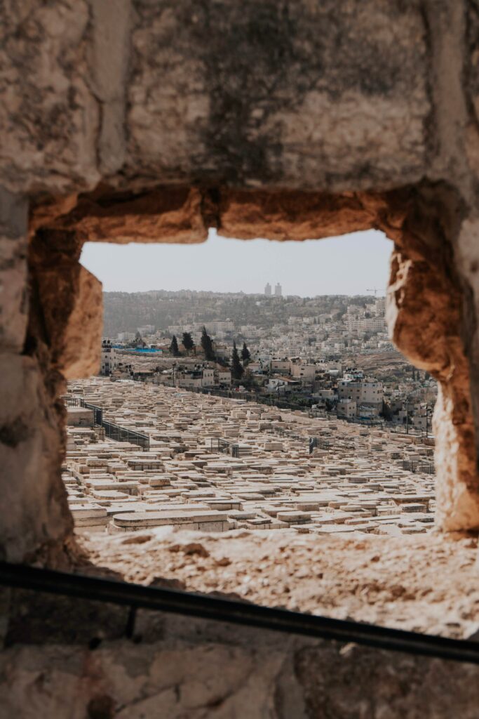 Charming Cityscape Wallpaper: Stone-Framed Urban View