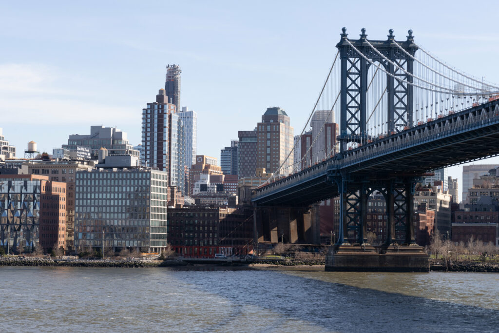 Stunning Cityscape Wallpaper: Modern Buildings & Steel Bridge by River
