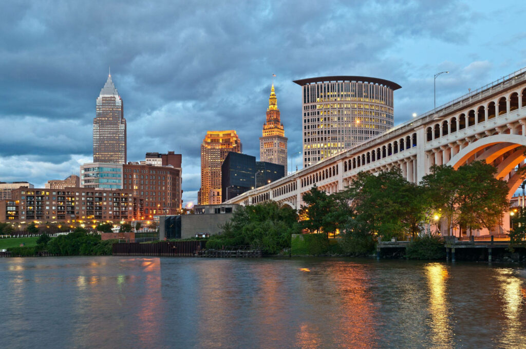 Stunning Cleveland Skyline Wallpaper: Cloudy Sky & Water Reflection