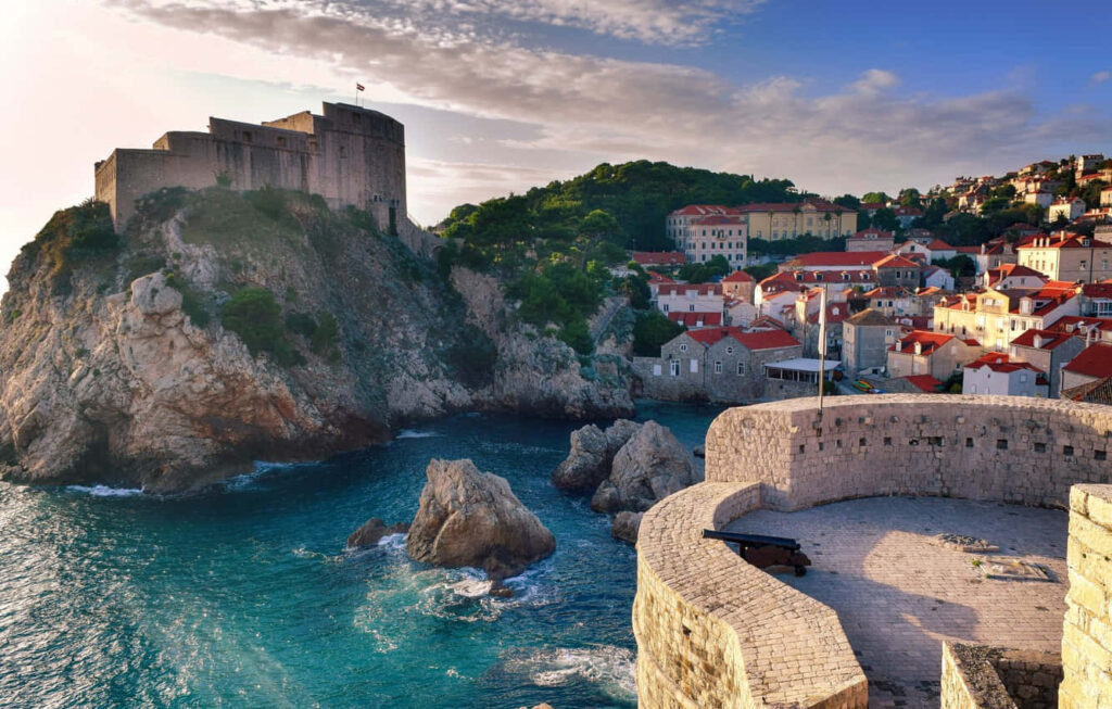 Stunning Coastal Fort Wallpaper: Croatia's Scenic Cliff View
