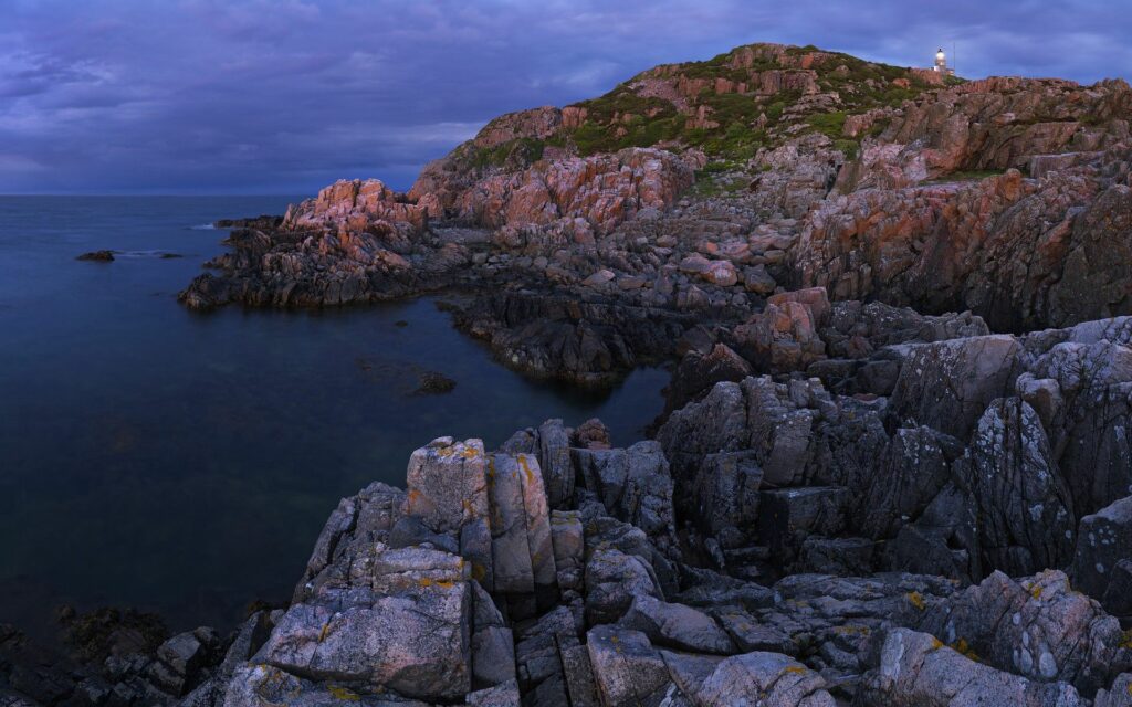 Stunning Coastal Landscape Wallpaper with Cliffs and Lighthouse