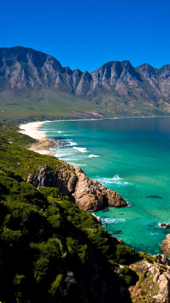 Stunning Coastal Landscape Wallpaper: Turquoise Waters & Sandy Beach