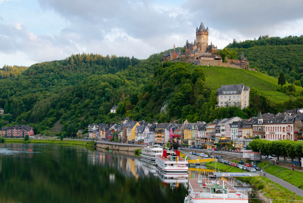 Scenic Cochem Castle Wallpaper: Charming German Riverside View