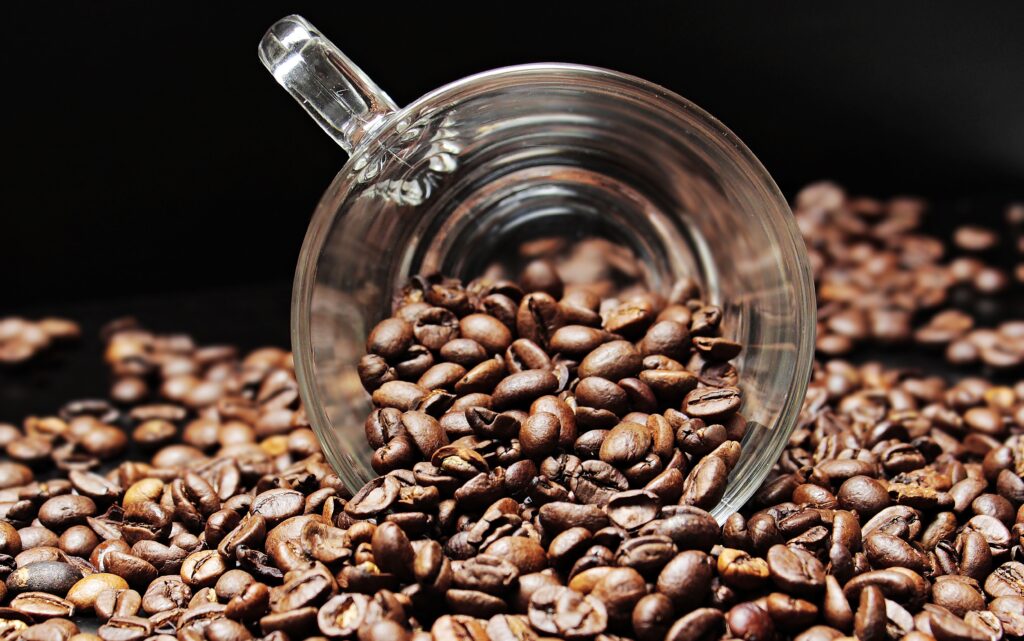 Elegant Coffee Bean Spill Wallpaper - Rich Textures & Dark Tones