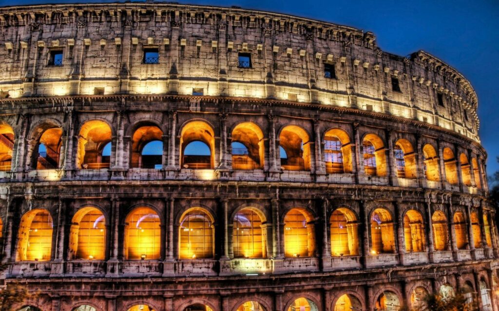 Stunning Nighttime Colosseum Wallpaper Background - Rome's Iconic Beauty