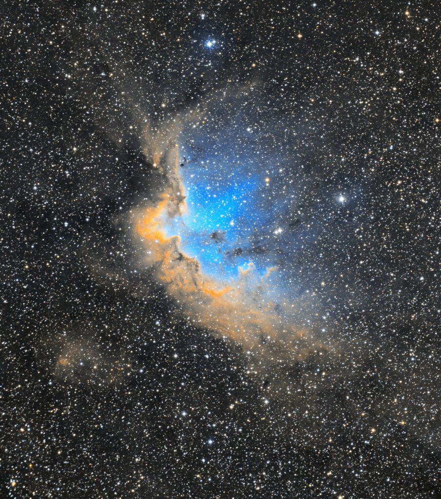 Vibrant Cosmic Nebula Wallpaper: Blue & Orange Starry Design