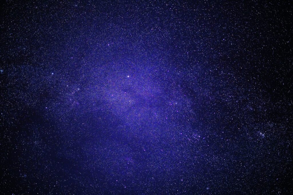 Stunning Cosmic Purple Space Wallpaper with Bright Stars & Constellations