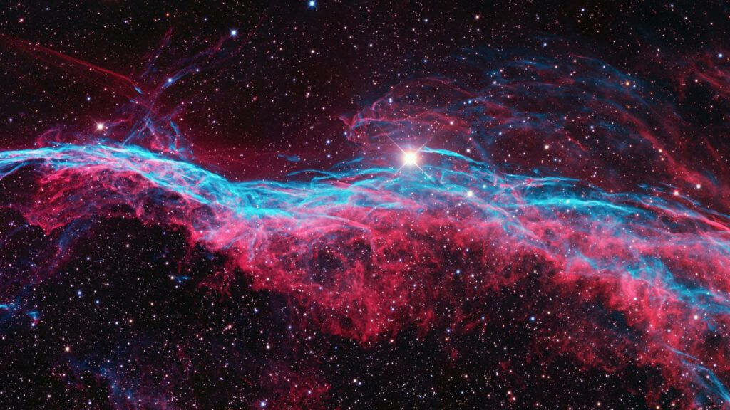 Cosmic Symphony: A Captivating Display of Red and Blue Splendor - Enchanting Space Wallpaper for PC