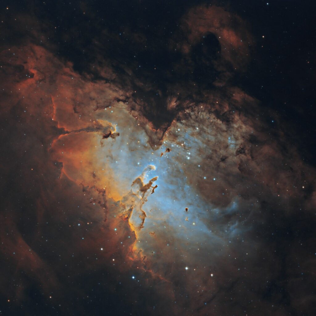 Vibrant Nebula Cosmic Wallpaper: Orange, Blue & Starry Depths