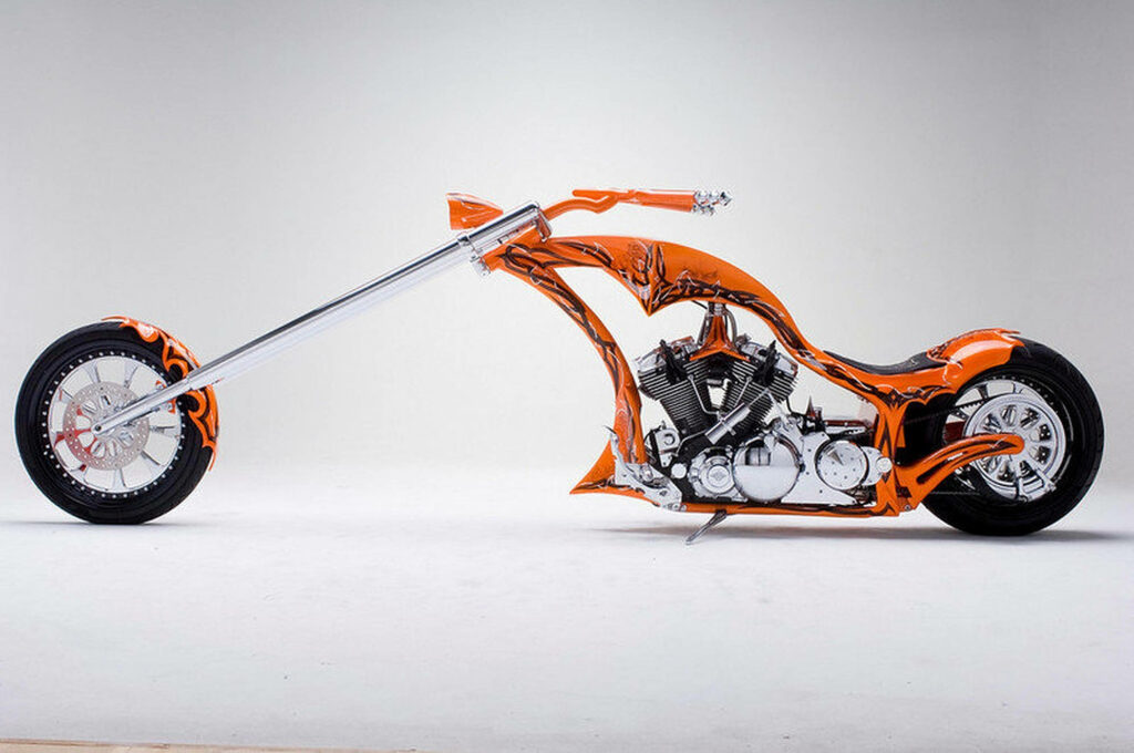 Stunning Orange Chopper Motorcycle Wallpaper on Minimalist Background