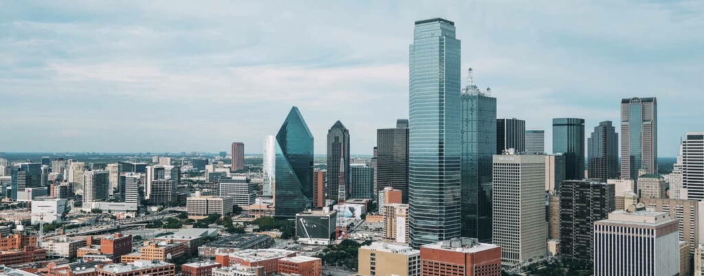 Stunning Dallas Skyline Wallpaper with Iconic Skyscrapers & Clouds