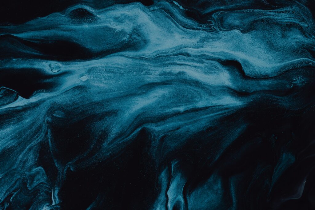 Stunning Dark Abstract Wallpaper: Swirling Paint Patterns Background