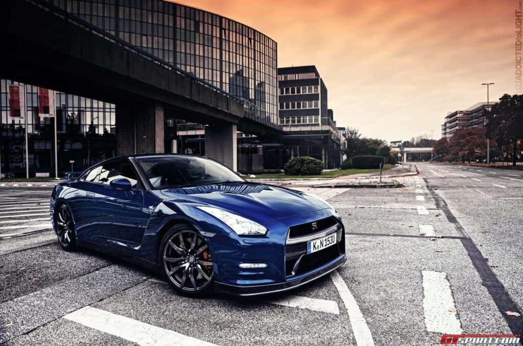 Stunning Dark Blue Nissan GT-R Urban Wallpaper with Sunset Background
