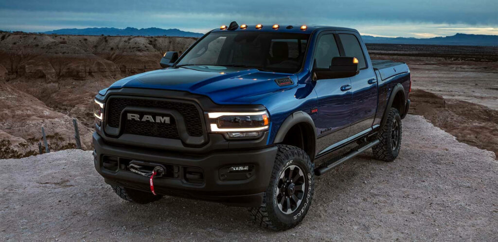 Stunning Dark Blue RAM Truck Wallpaper: Rugged Off-Road Adventure