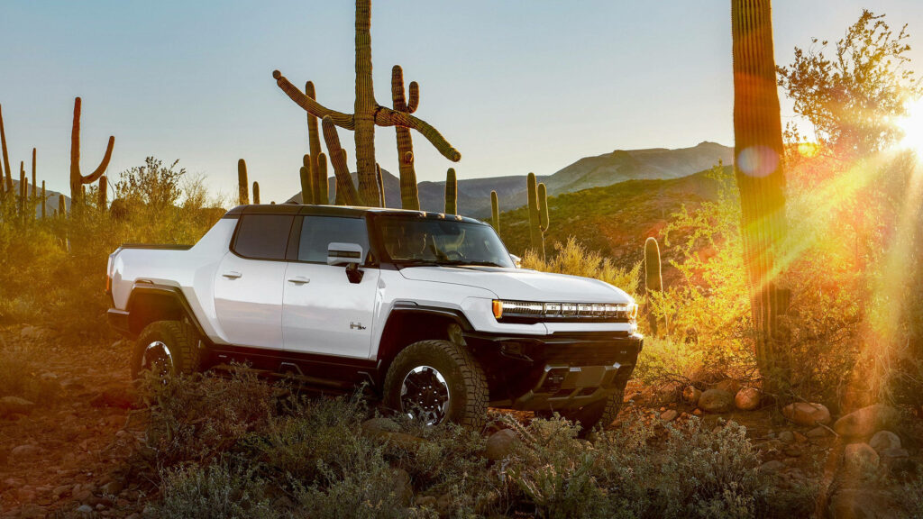 Rugged White Hummer in Scenic Desert: Adventure Wallpaper Background