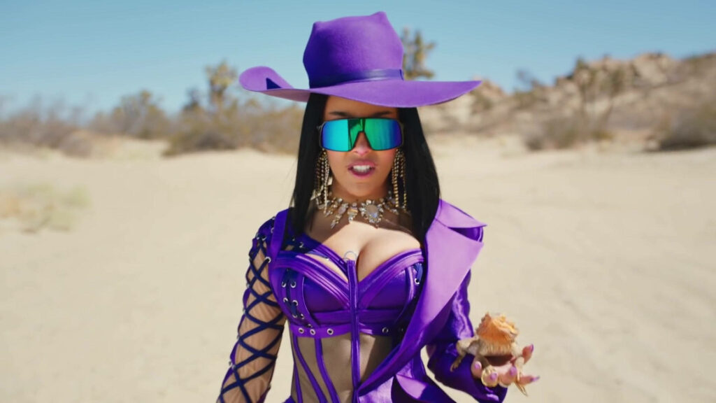 Vibrant Doja Cat Wallpaper: Purple Outfit in Desert Background