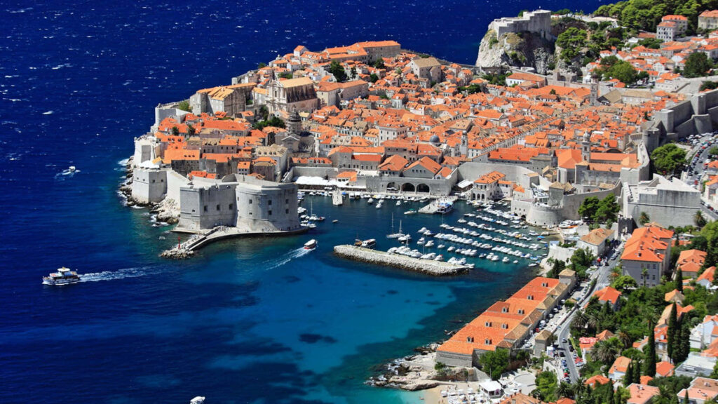 Stunning Dubrovnik Wallpaper: Coastal City with Iconic Orange Roofs
