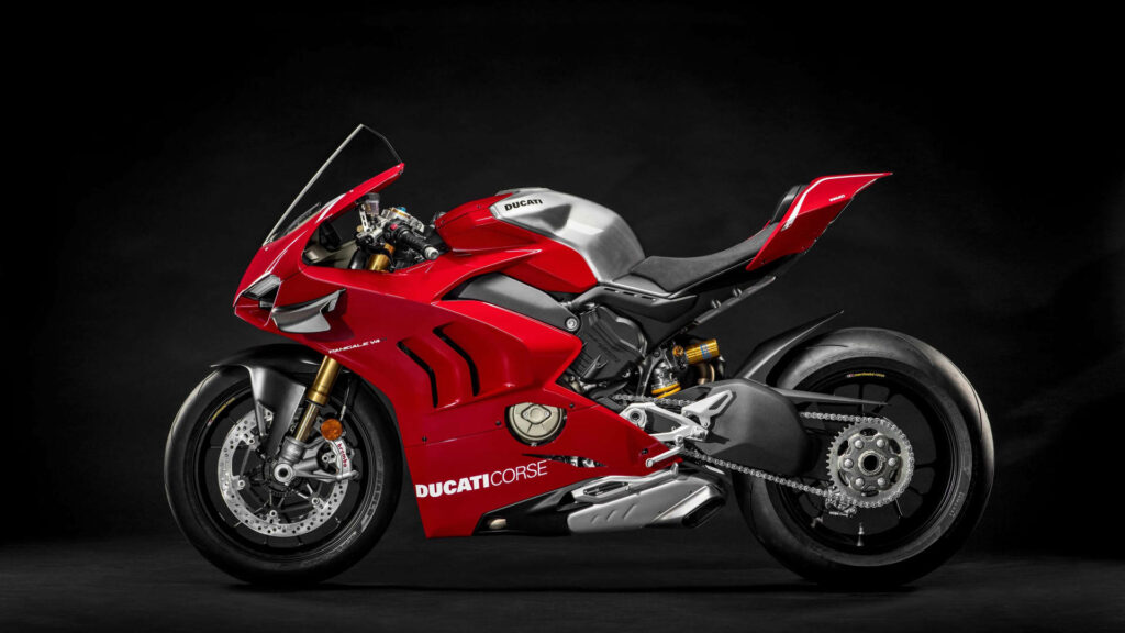 Vibrant Ducati Monster Wallpaper: Speed Meets Style on Dark Background