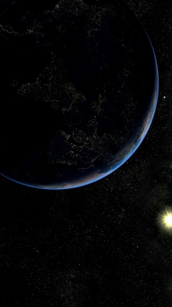 Stunning Earth view from space with illuminated edges and a starry night sky wallpaper