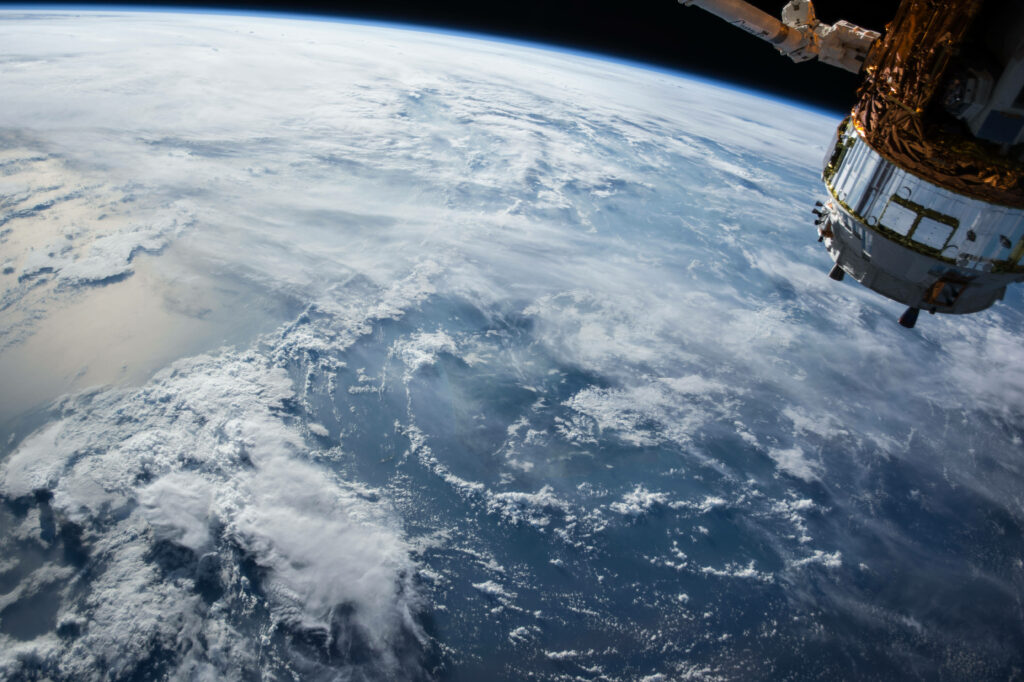 Stunning Earth Wallpaper: Blue Oceans & Space Station View