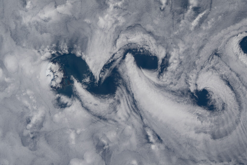 Stunning Earth Wallpaper: Serene Space View with Intricate Clouds