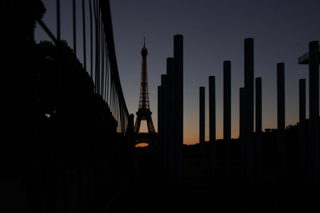 Eiffel Tower Sunset Wallpaper - Serene Parisian Silhouette Art