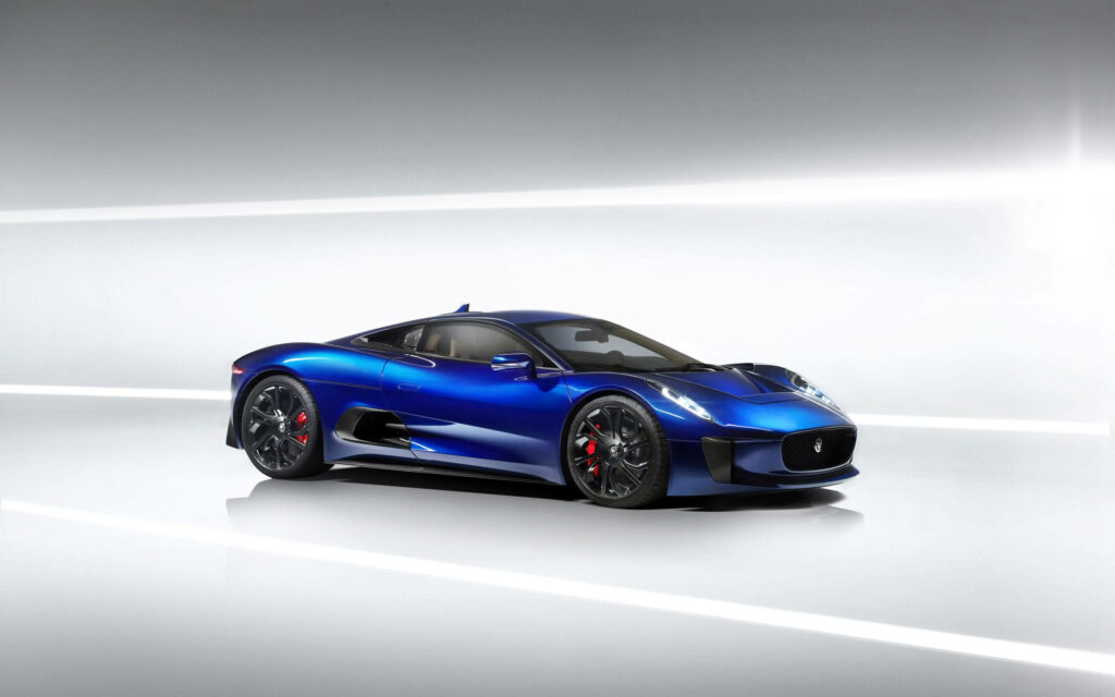 Electric Blue Jaguar Wallpaper: Sleek, High-Performance Design