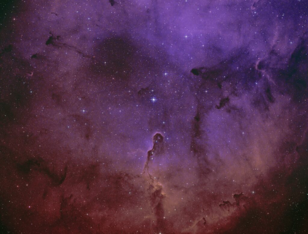 Stunning Elephant Trunk Nebula Wallpaper: Cosmic Purple & Red Beauty