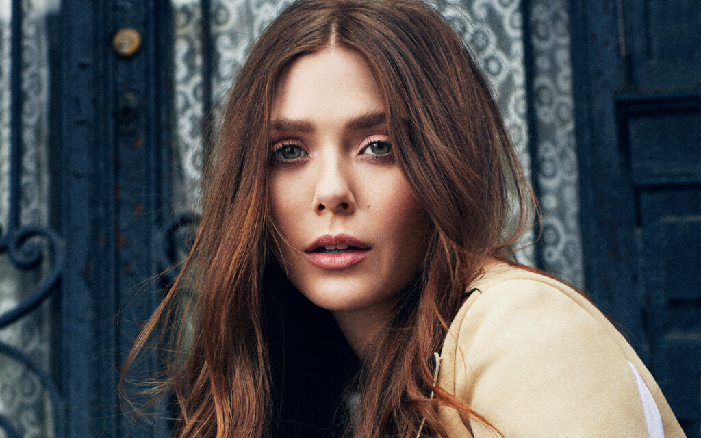 Stunning Wallpaper of Elizabeth Olsen: Captivating Expression & Elegant Background