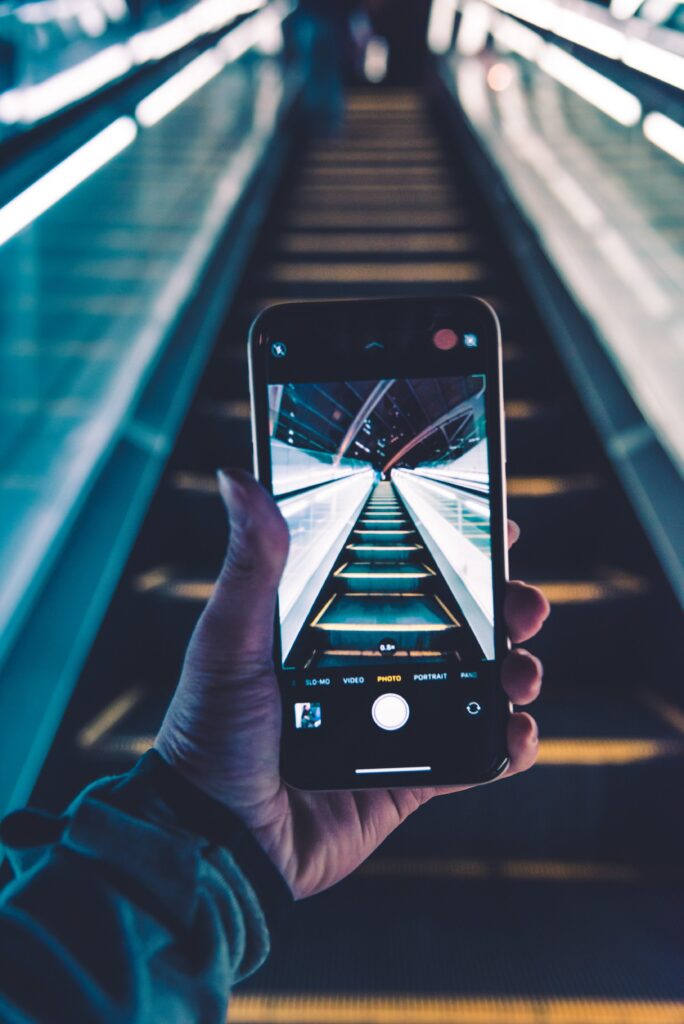 Vivid Escalator Wallpaper: Urban Technology & Deep Focus Art