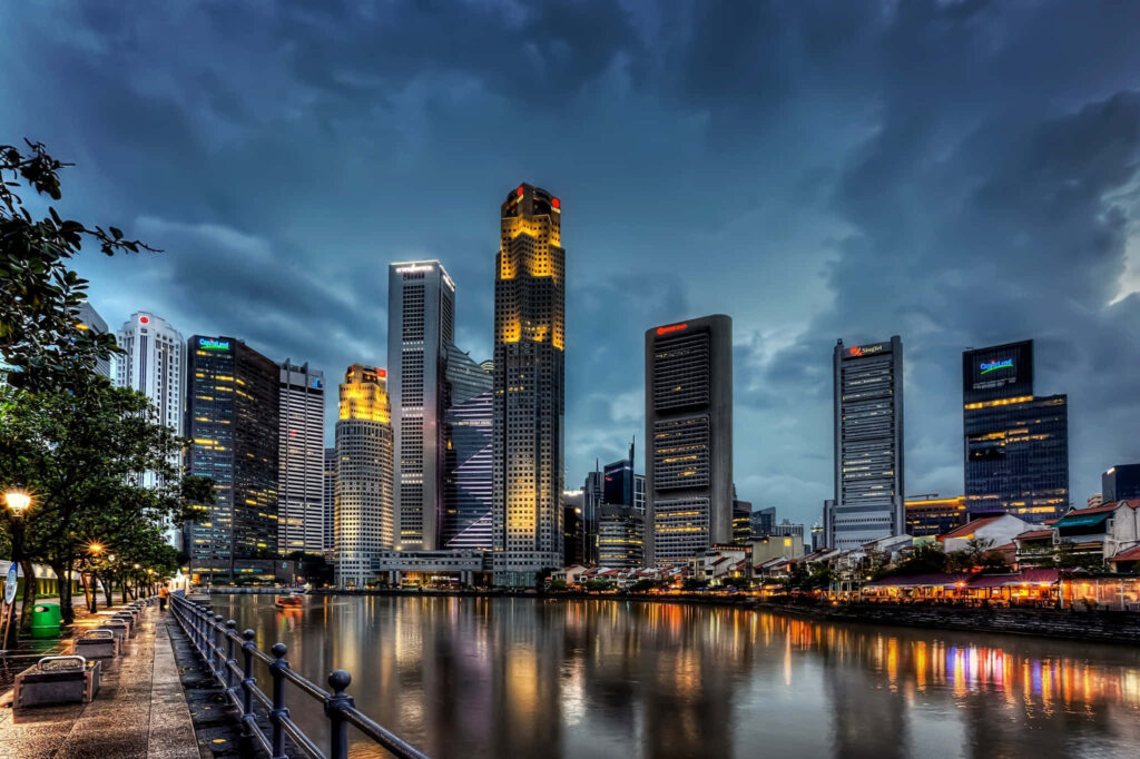 Stunning Evening Cityscape: Modern Skyline Reflection Wallpaper