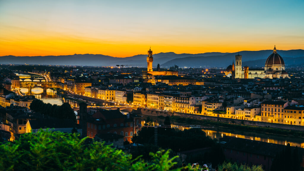 “Stunning Evening Cityscape Wallpaper: River, Towers & Sunset Vibes”