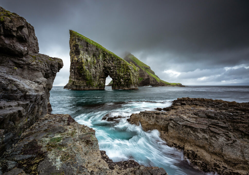 Stunning Faroe Islands Wallpaper: Rugged Cliffs & Dramatic Arch