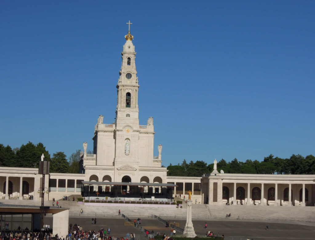 Stunning Fatima Sanctuary Wallpaper Against Blue Sky - Iconic Architecture