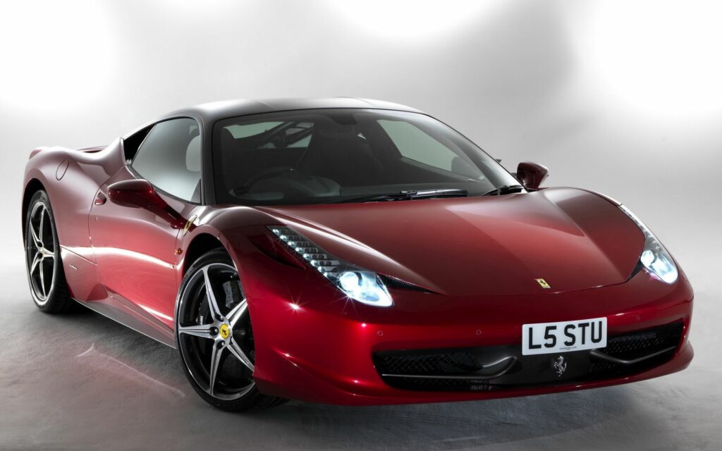 Stunning Ferrari 458 Italia Wallpaper in Glossy Red with Minimalist Background
