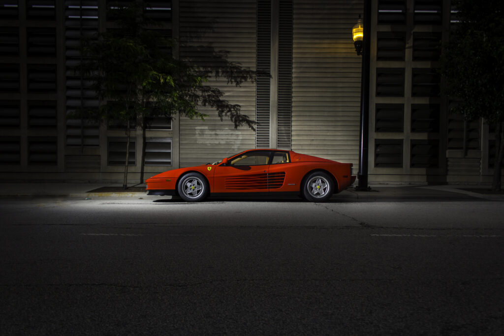 Sleek Ferrari Testarossa F110: Nighttime Urban Wallpaper