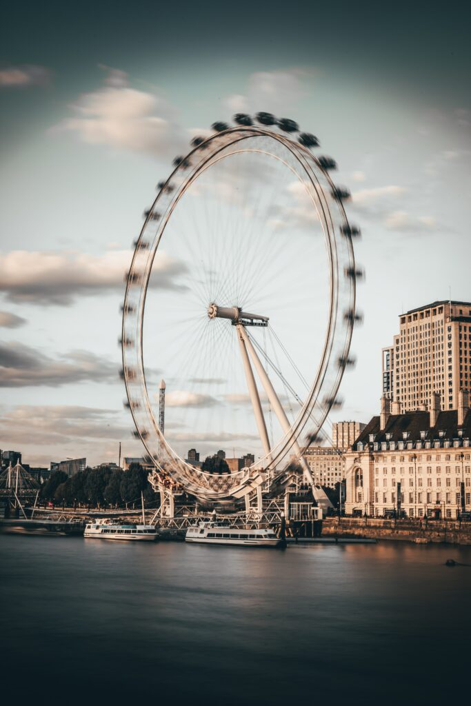 Serene Ferris Wheel Wallpaper: City Dock & Modern Architecture