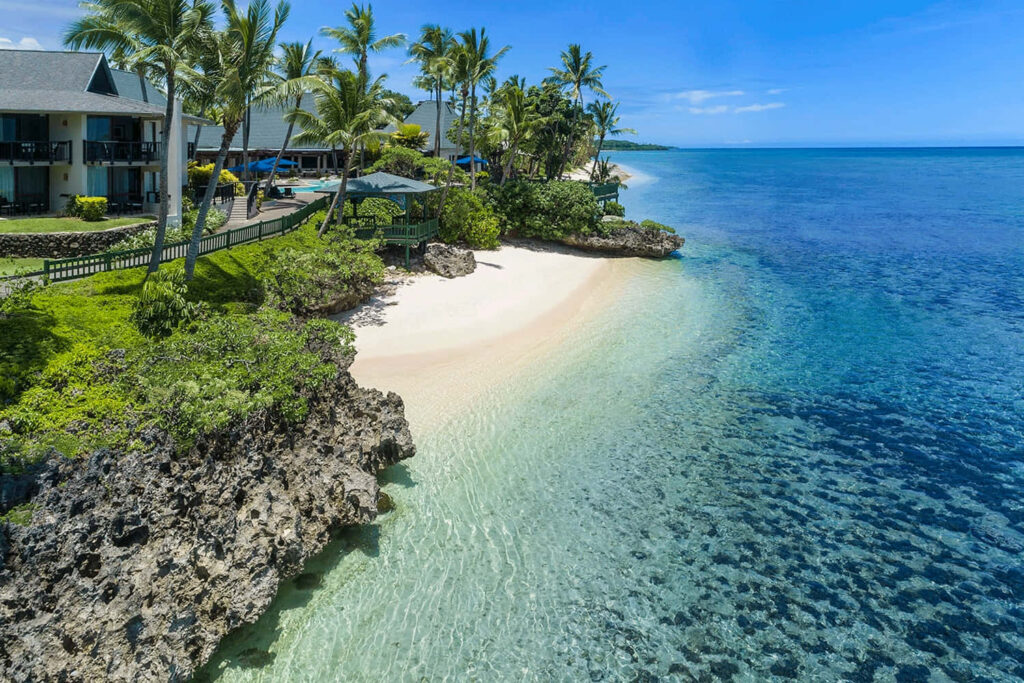 Stunning Fiji Beach Wallpaper: Azure Waters & Lush Tropical Paradise